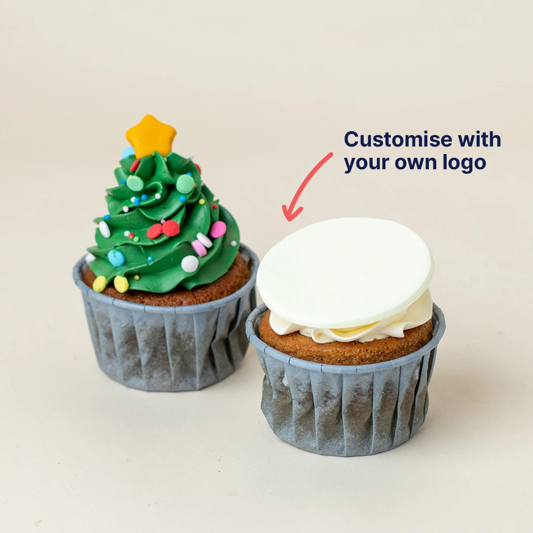 Custom edible logo disc on Bob the Baker Boy Christmas cupcake