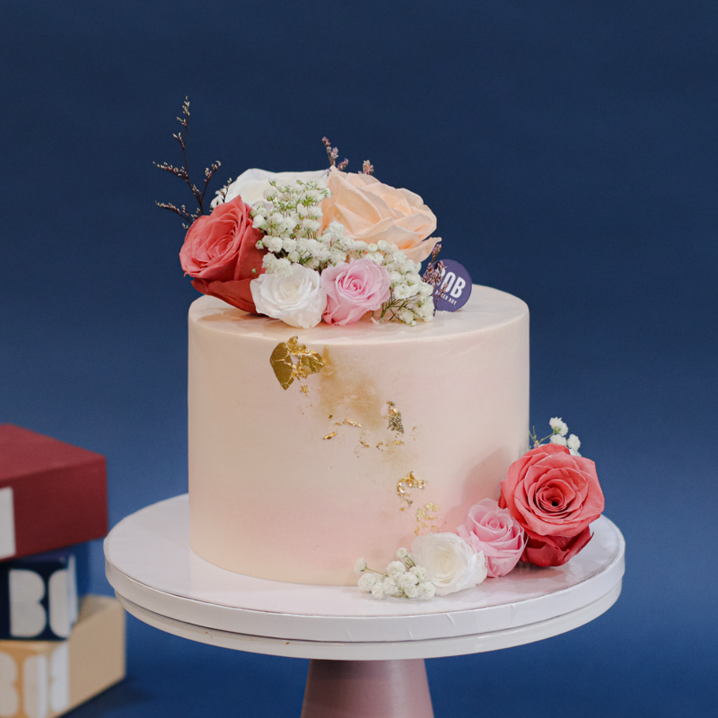 Pastel Pink Cake with Tri-Color Floral and Gold