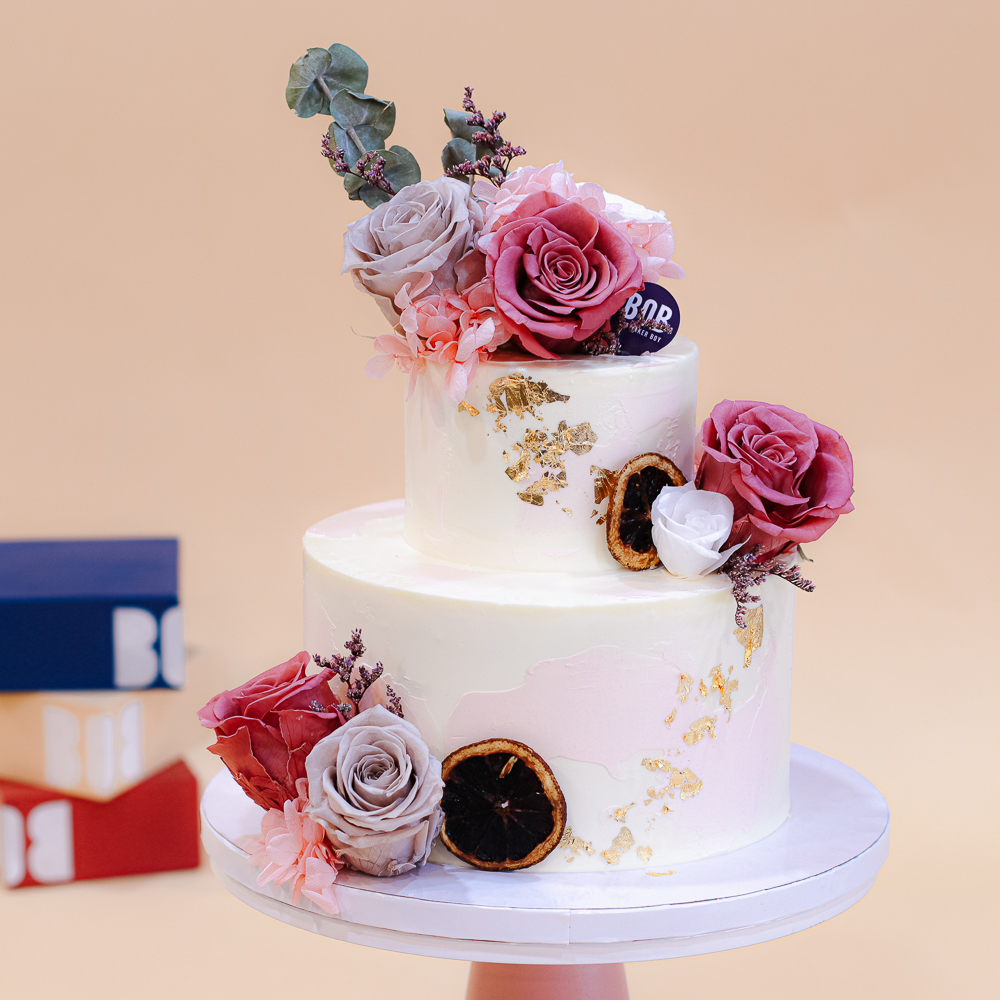 Pastel Pink Smear Cake with Dusty Rose Floral and Dried Petals 