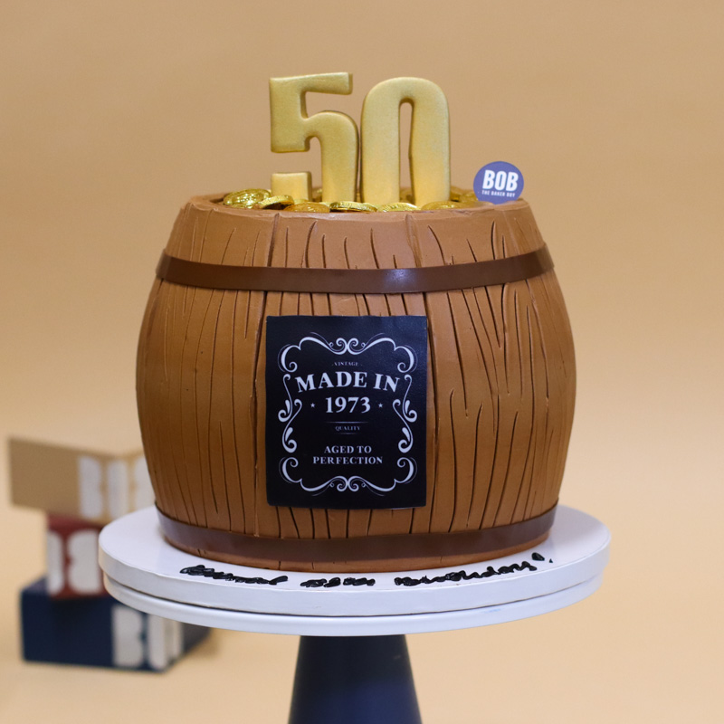 Whiskey Barrel and Gold Coins Cake