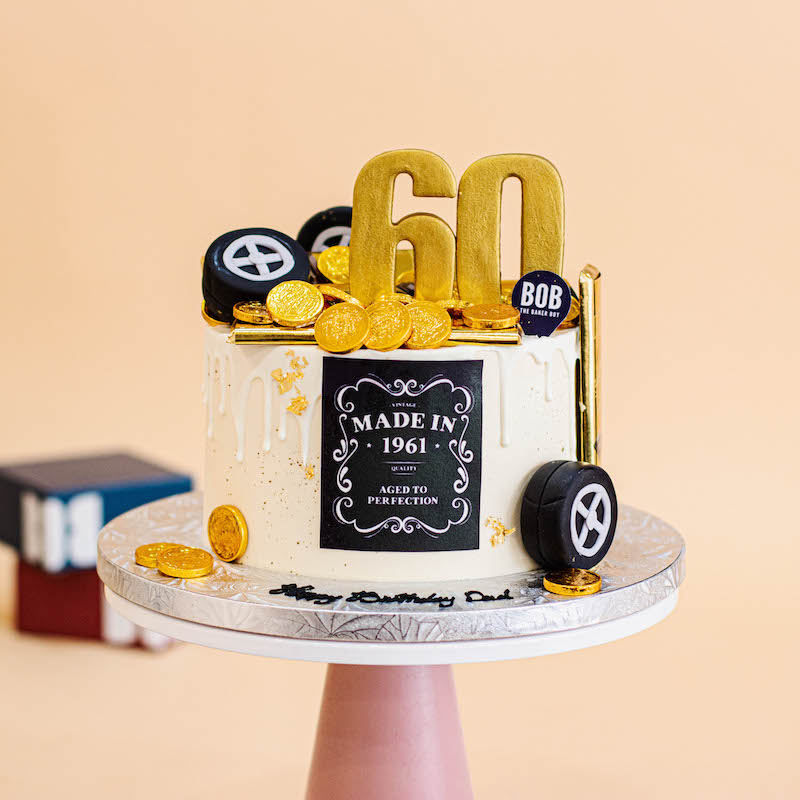 Wheels and Gold Bars Cake in Classy White