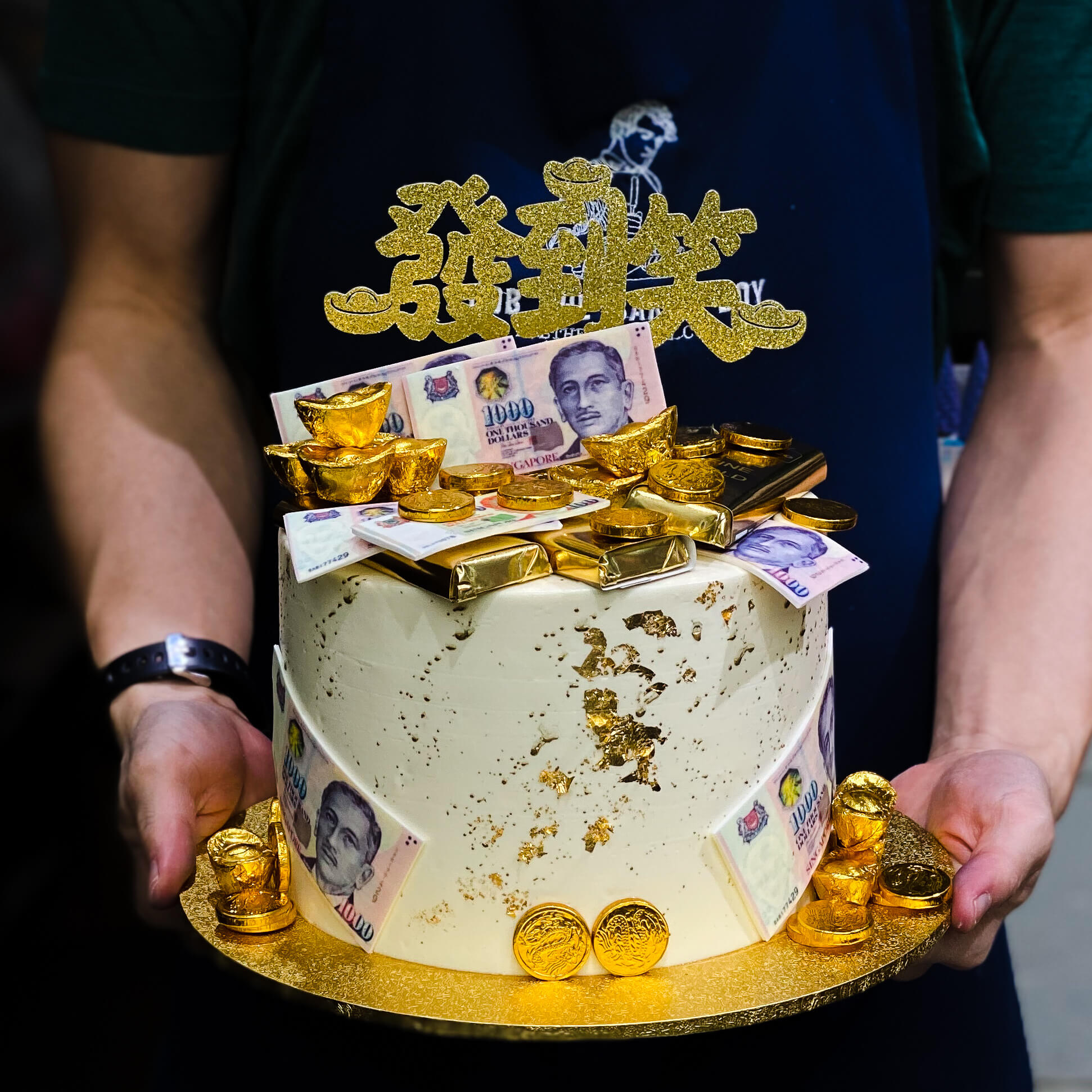 money pulling cakes in Singapore